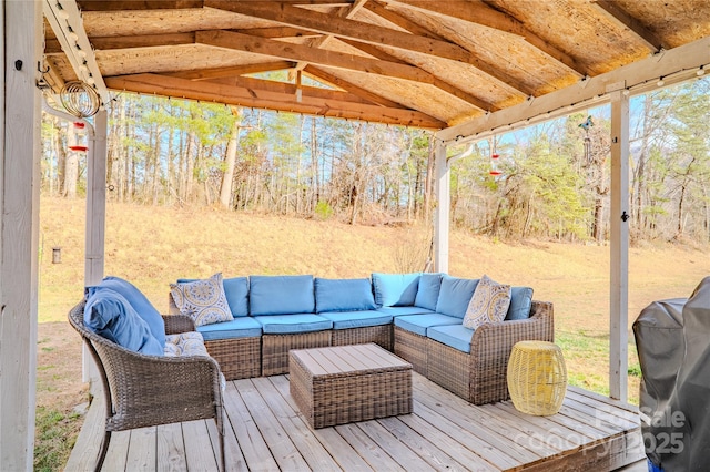 deck featuring an outdoor living space and area for grilling