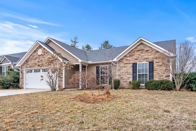 view of front of property featuring a garage and a front yard