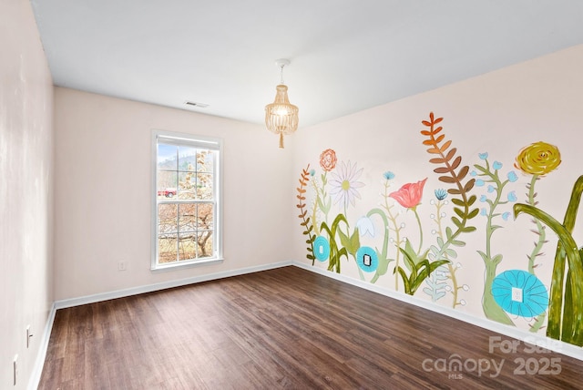 playroom with dark hardwood / wood-style floors