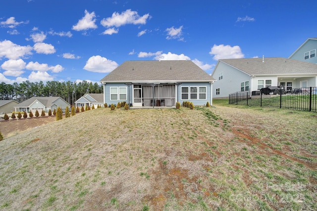 5239 Admirals Lndg, Lancaster, SC 29720 - rear view of house featuring a sunroom and a lawn
