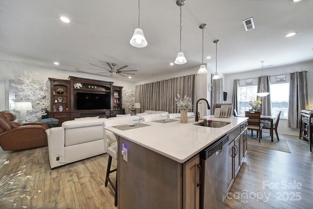 5239 Admirals Lndg, Lancaster, SC 29720 - kitchen featuring hanging light fixtures, sink, dishwasher, and a kitchen island with sink