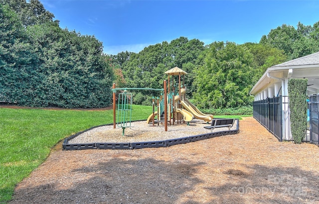 view of playground with a yard