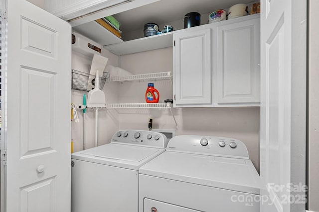 laundry room featuring cabinets and independent washer and dryer