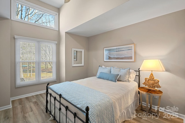 bedroom with light hardwood / wood-style flooring