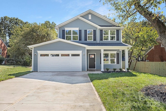 view of front of property with driveway, a front lawn, and fence