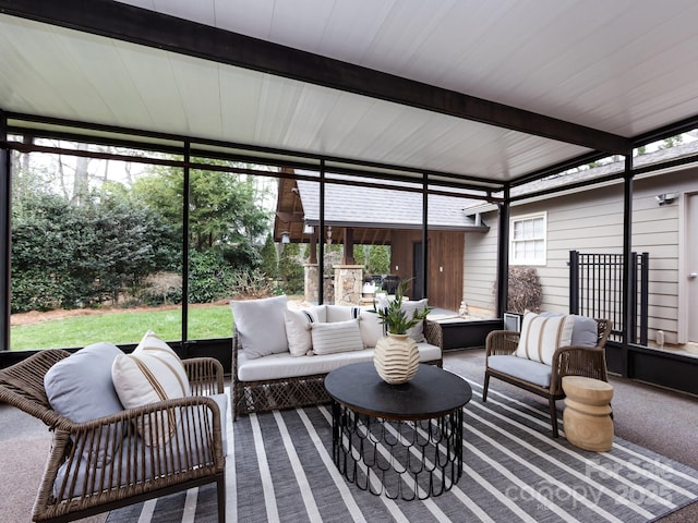 sunroom / solarium with beam ceiling