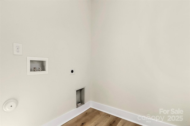 clothes washing area with washer hookup, hardwood / wood-style floors, and hookup for an electric dryer