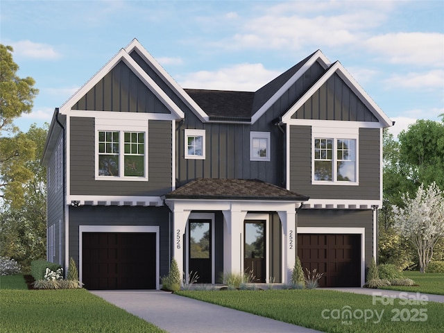 modern farmhouse featuring board and batten siding, a front lawn, and an attached garage