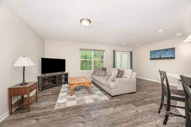 122 Red Plum Ln, Jamestown, NC 27282 - living room with wood finished floors, baseboards, and recessed lighting