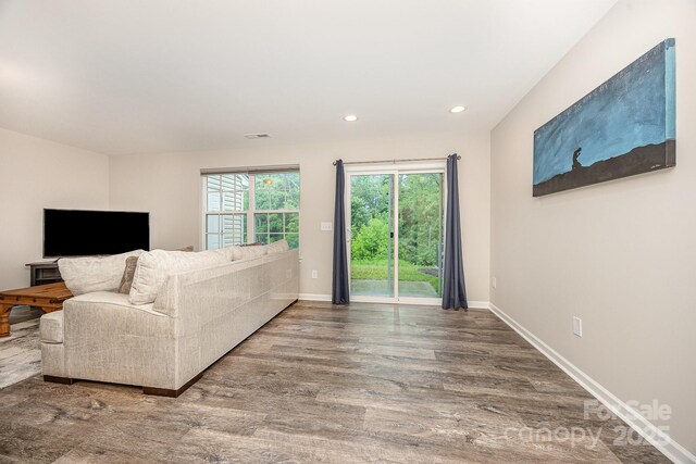 122 Red Plum Ln, Jamestown, NC 27282 - living room with wood finished floors, recessed lighting, and baseboards