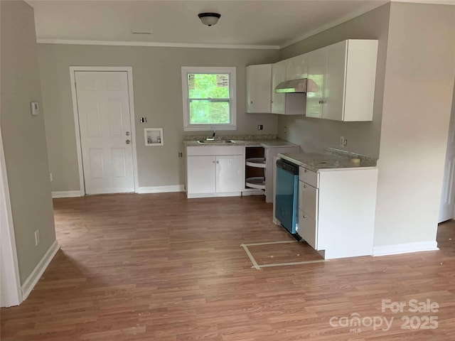 kitchen with sink, white cabinetry, light wood-type flooring, ornamental molding, and dishwasher