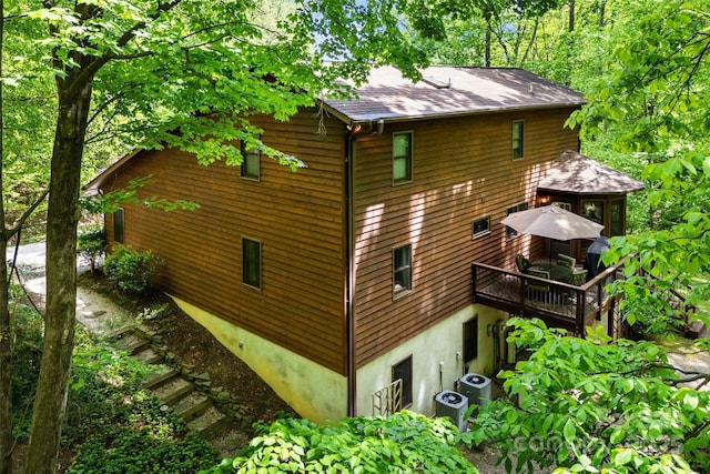 33 Cammies Way, Old Fort, NC 28762 - view of side of property with a gazebo, roof with shingles, central AC unit, and a deck