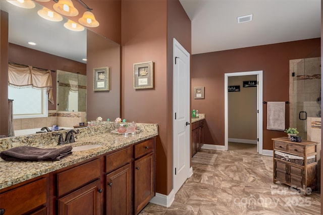 bathroom featuring vanity and walk in shower