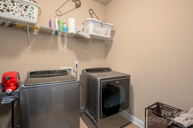 laundry area featuring separate washer and dryer