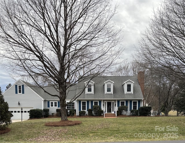 cape cod home with a garage, a front lawn, and a chimney