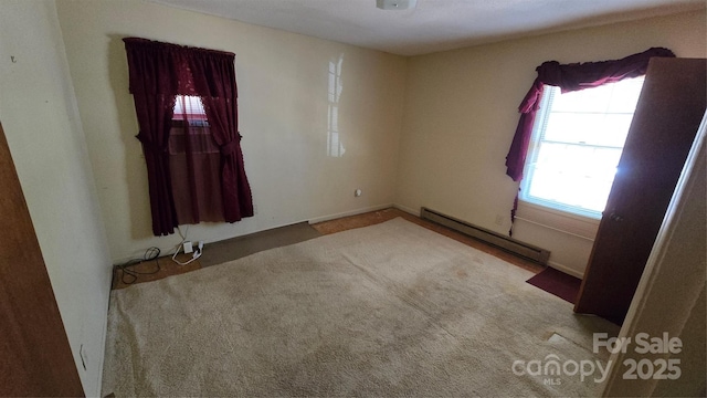 509 California Cir, York, SC 29745 - empty room featuring a baseboard heating unit