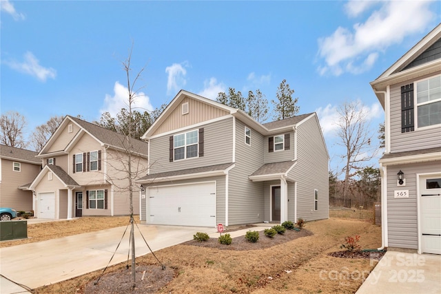 front of property featuring a garage