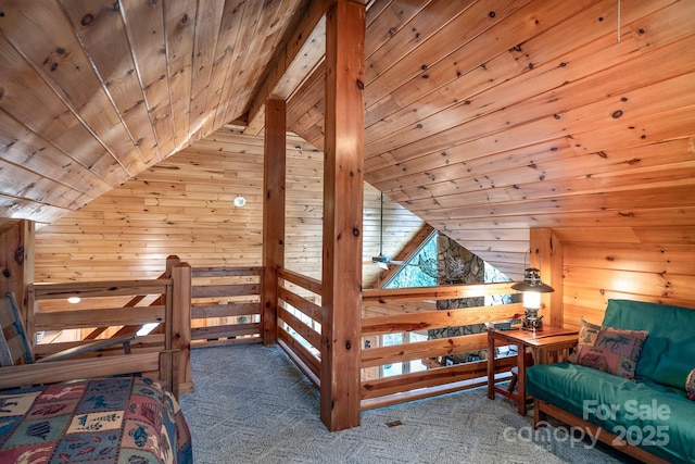 carpeted bedroom featuring vaulted ceiling with beams, wooden ceiling, and wood walls