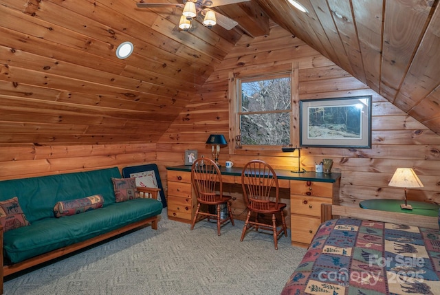 bedroom featuring lofted ceiling with beams, light colored carpet, wooden ceiling, and wood walls