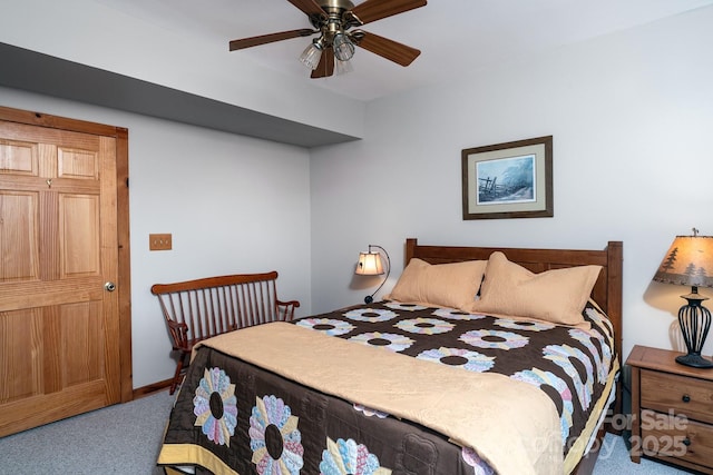 bedroom featuring ceiling fan and carpet flooring