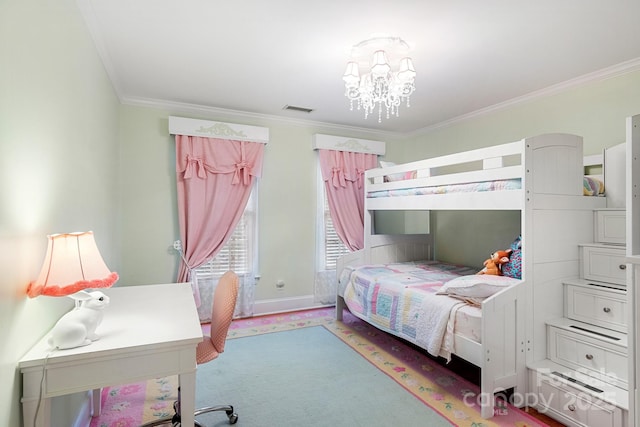 bedroom with crown molding and an inviting chandelier