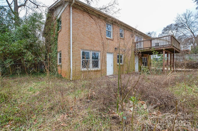 rear view of property with a deck