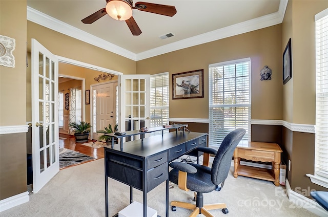 office area with light colored carpet, french doors, visible vents, and crown molding