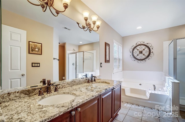 full bathroom with toilet, a stall shower, a sink, and visible vents