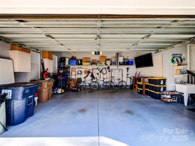 garage featuring a sink