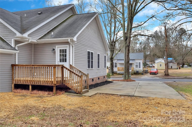 rear view of property featuring a patio