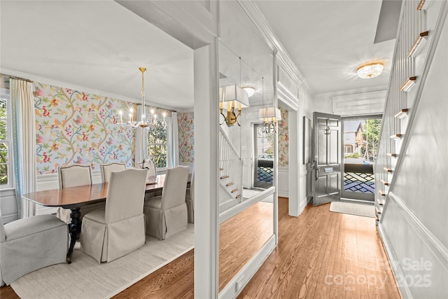 interior space with plenty of natural light and a notable chandelier