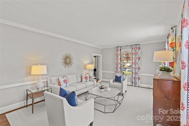 living room with baseboards and ornamental molding