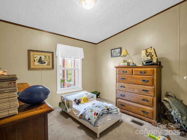 carpeted bedroom featuring a textured ceiling, vaulted ceiling, visible vents, and crown molding