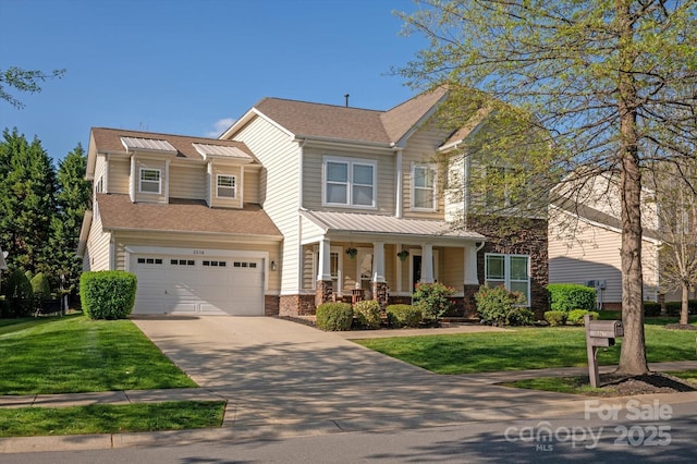 3216 Bridgewick Rd, Waxhaw, NC 28173 - view of front of home with a front yard, an attached garage, concrete driveway, and covered porch