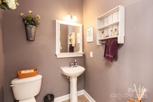 3216 Bridgewick Rd, Waxhaw, NC 28173 - half bathroom with tile patterned flooring, toilet, and baseboards