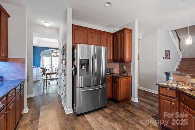 3216 Bridgewick Rd, Waxhaw, NC 28173 - kitchen with decorative backsplash, baseboards, stainless steel fridge, and dark wood finished floors