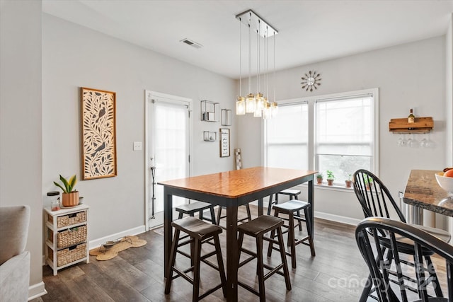 3216 Bridgewick Rd, Waxhaw, NC 28173 - dining space featuring dark wood finished floors, visible vents, and baseboards