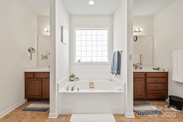 3216 Bridgewick Rd, Waxhaw, NC 28173 - full bathroom featuring a bath, tile patterned flooring, and two vanities