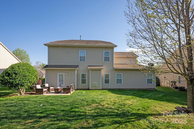 3216 Bridgewick Rd, Waxhaw, NC 28173 - back of house with a lawn, a patio area, and an outdoor hangout area