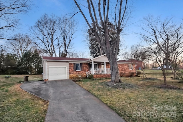 ranch-style house with a garage, a porch, a front yard, and brick siding