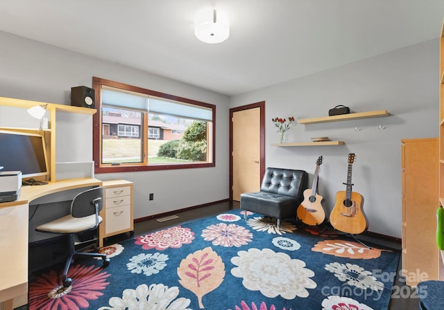 office featuring visible vents and baseboards