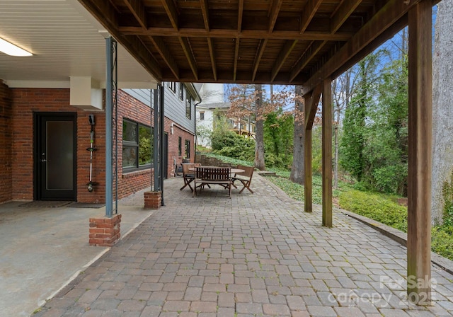 view of patio featuring outdoor dining space