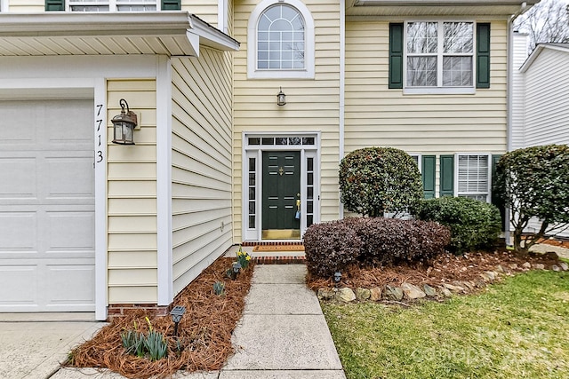 property entrance featuring a garage