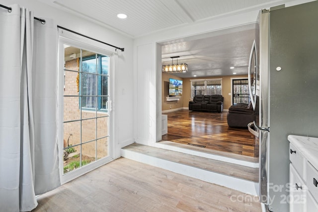 doorway featuring light hardwood / wood-style flooring