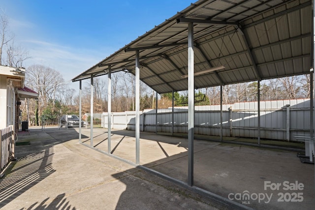 view of parking with a carport