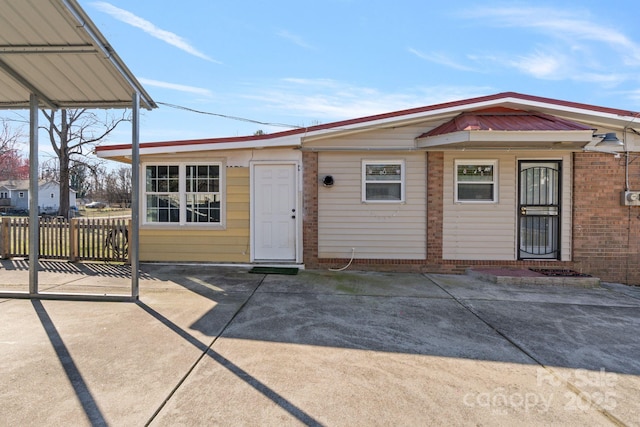 view of front of home with a patio area