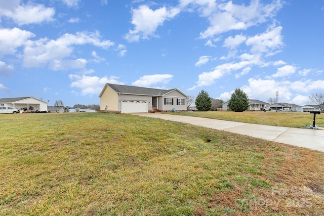 ranch-style home with a garage and a front lawn