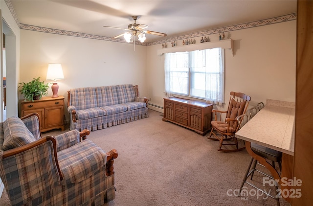 carpeted living room with ceiling fan and a baseboard radiator