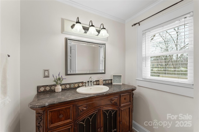 bathroom featuring tasteful backsplash, vanity, and ornamental molding