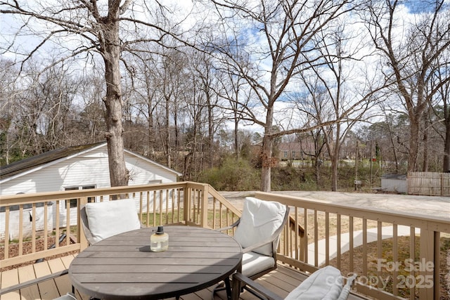 deck featuring outdoor dining space